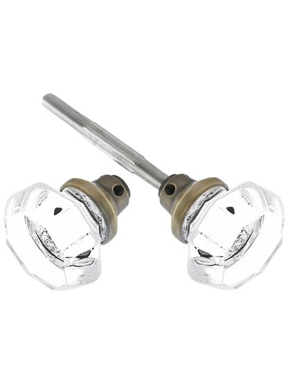 Pair of Octagonal Crystal Door Knobs With Solid Brass Base in Antique Brass.